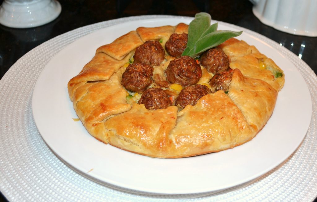 Winter- Rustic chicken pot pie with sage garnish