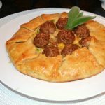 Winter- Rustic chicken pot pie with sage garnish